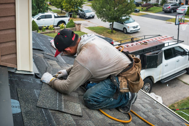 Professional Roof Replacement technician working in West Lebanon, NH